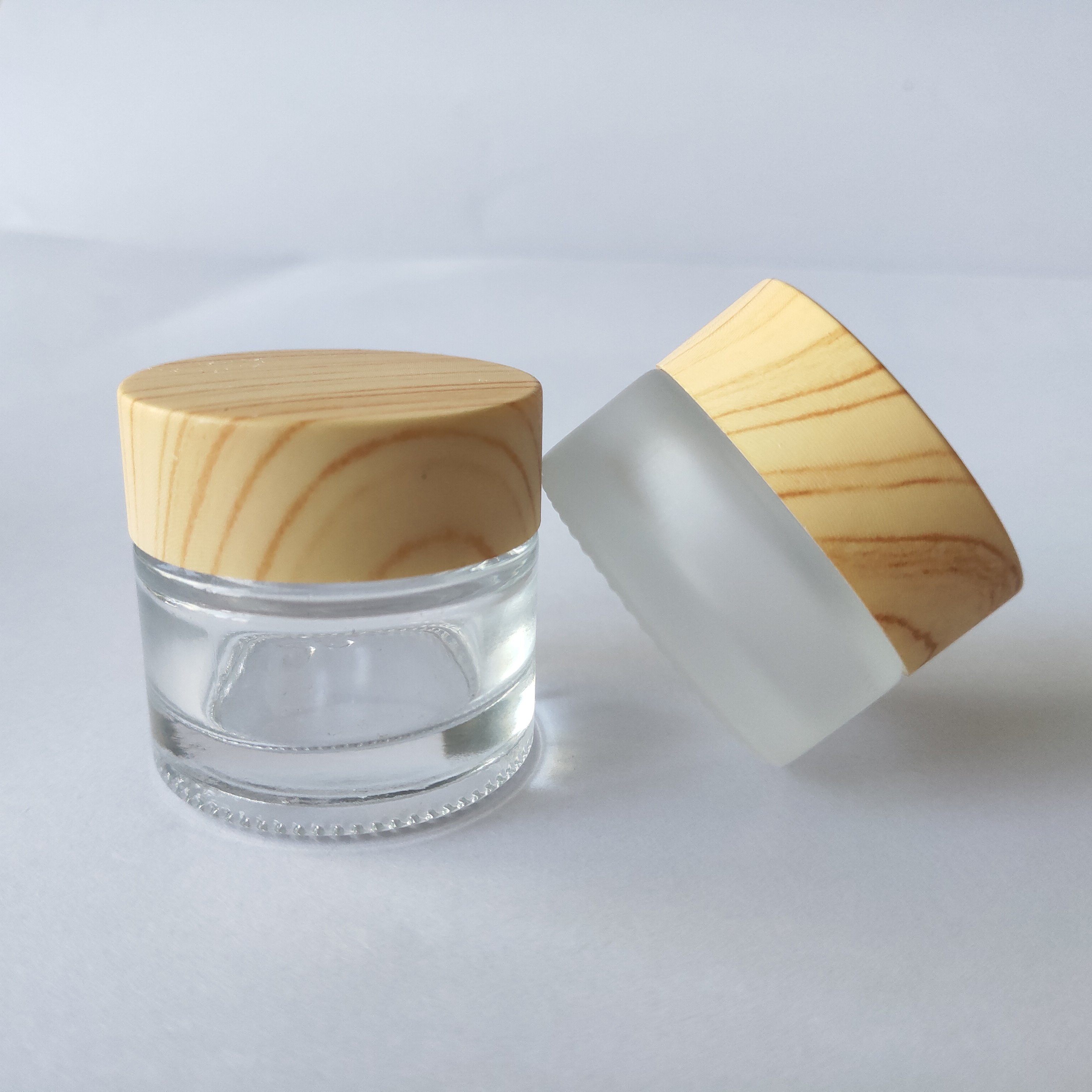 Wholesale 5g 5ml Small Cosmetic Frosted Clear Glass Cream Jar With Wood Lid