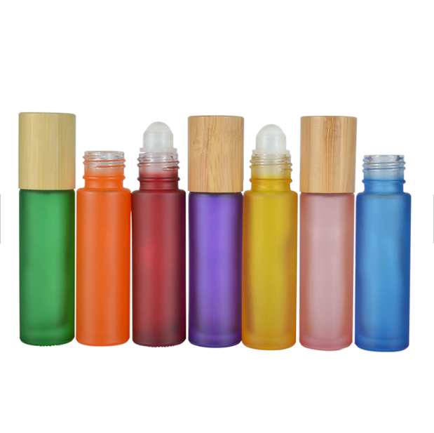 Wholesale 5ml 10ml Clear Frosted Essential Oil Glass Roll On Bottle With Bamboo Lid Metal Roller Ball