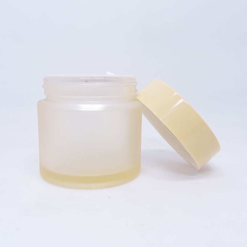 Wholesale 60g 2oz cosmetic custom printing frosted scrub colored matte orange face cream glass jar