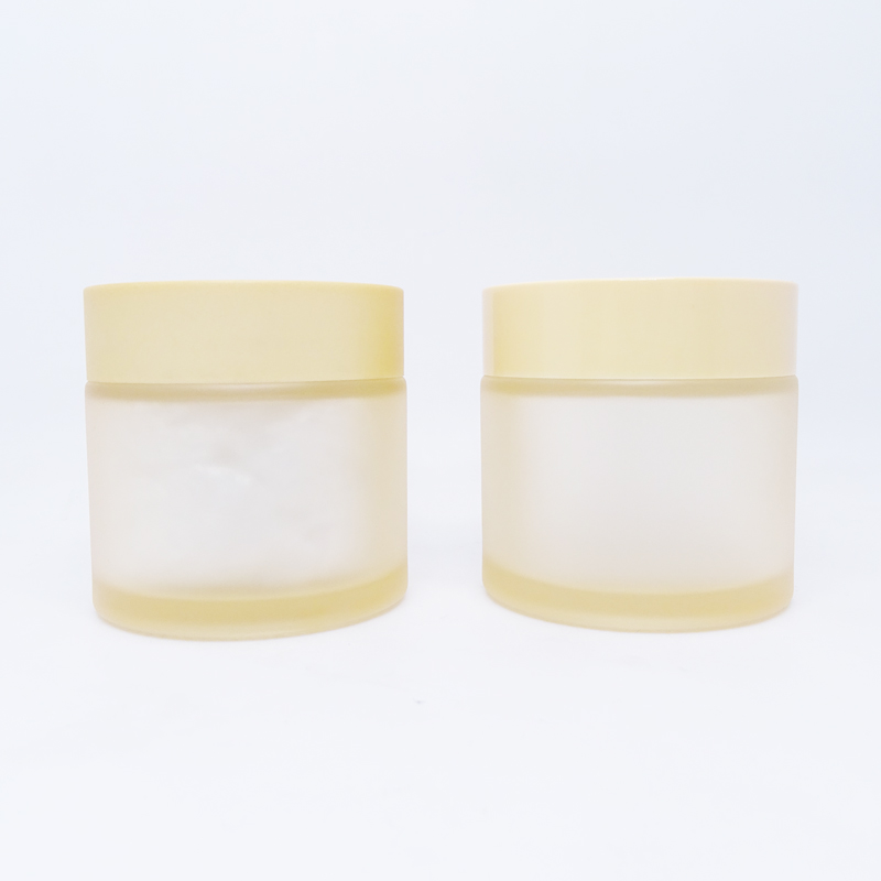 Wholesale 60g 2oz cosmetic custom printing frosted scrub colored matte orange face cream glass jar