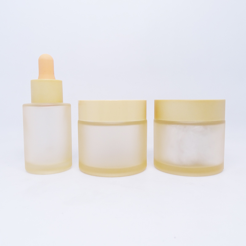 Wholesale 60g 2oz cosmetic custom printing frosted scrub colored matte orange face cream glass jar