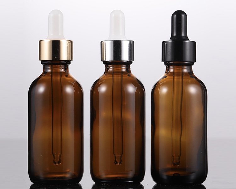 Wholesale 60ml/2oz amber glass serum bottle cosmetic dropper bottle with scale