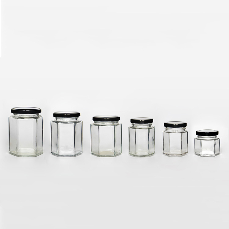 Wholesale 700ml Hexagonal Glass Honey Container Honey Storage Jar Glass Honey Jar With Matel Lid
