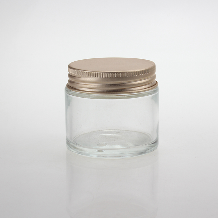 Wholesale 70ml gold aluminum cap clear glass jar horse oil cosmetic cream package
