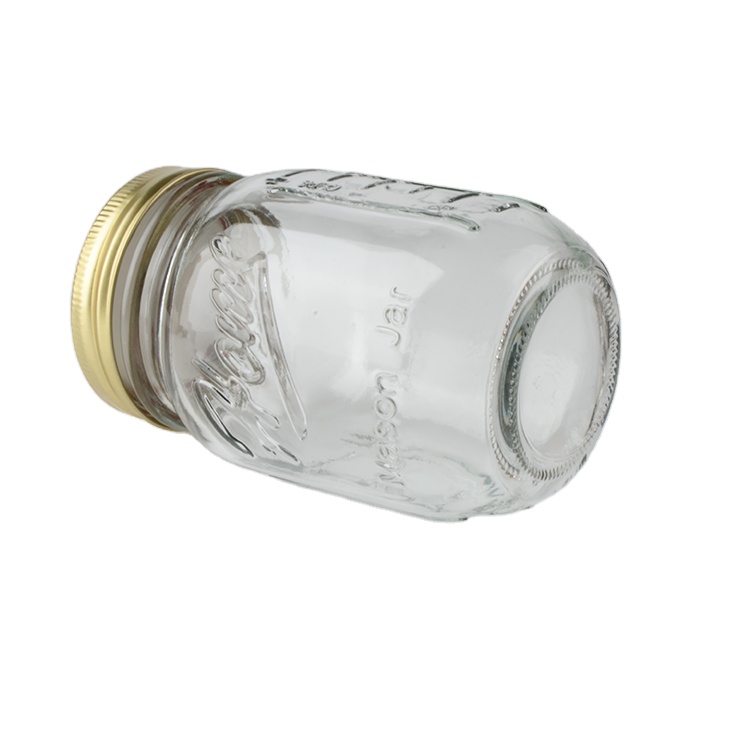 Wholesale 8 oz 16 oz 32 oz Empty Clear Glass Mason Jar Food Storage Glass Jar with Golden Color Two Pieces Canning Lids