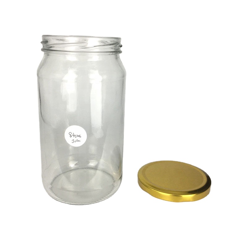 Wholesale 840ml empty round glass food storage jar for jam honey pickles jar with lid