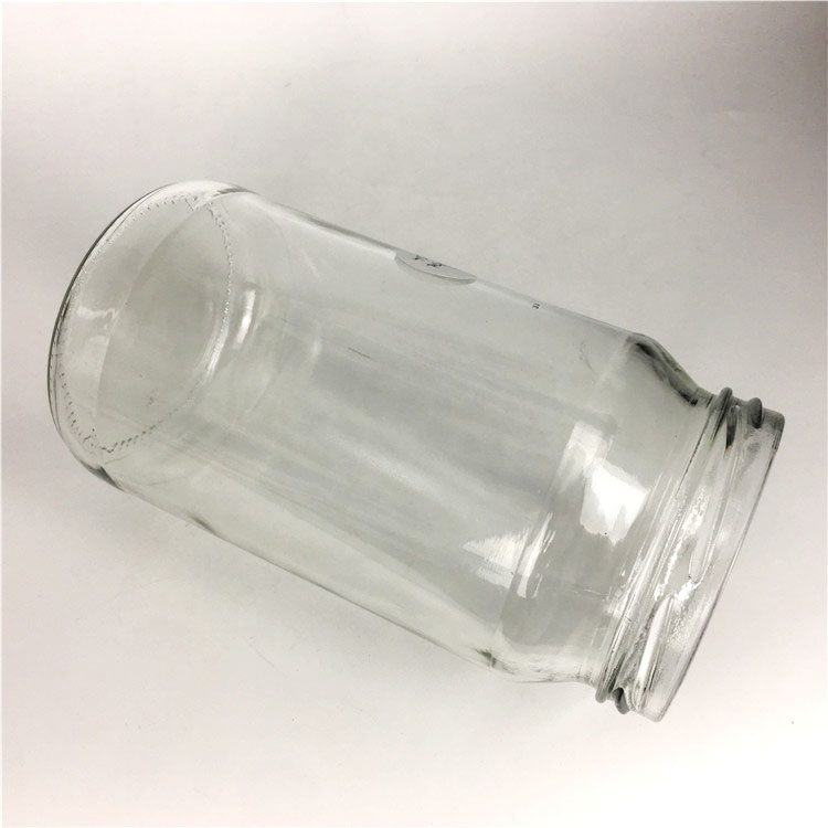 Wholesale 840ml empty round glass food storage jar for jam honey pickles jar with lid