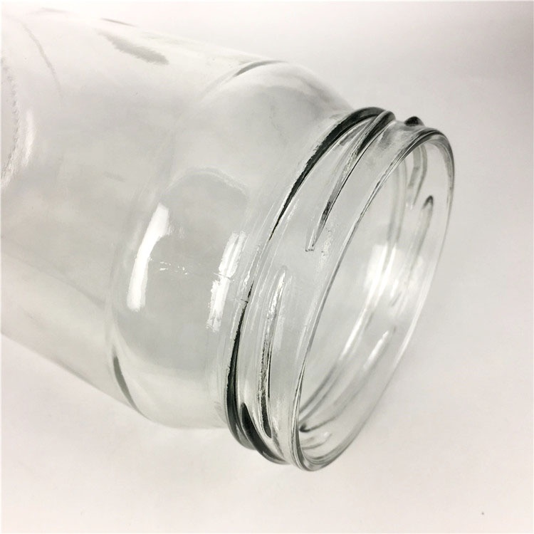 Wholesale 840ml empty round glass food storage jar for jam honey pickles jar with lid