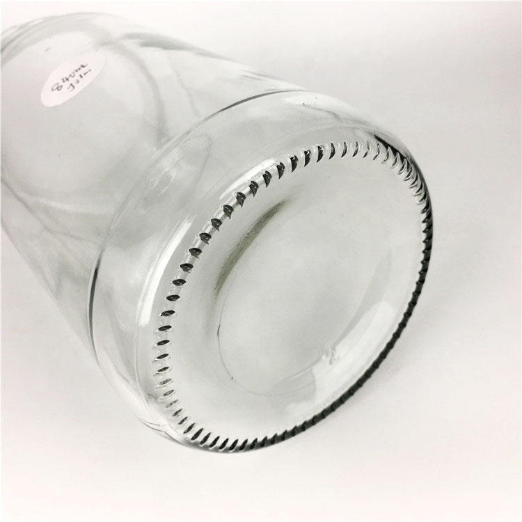 Wholesale 840ml empty round glass food storage jar for jam honey pickles jar with lid