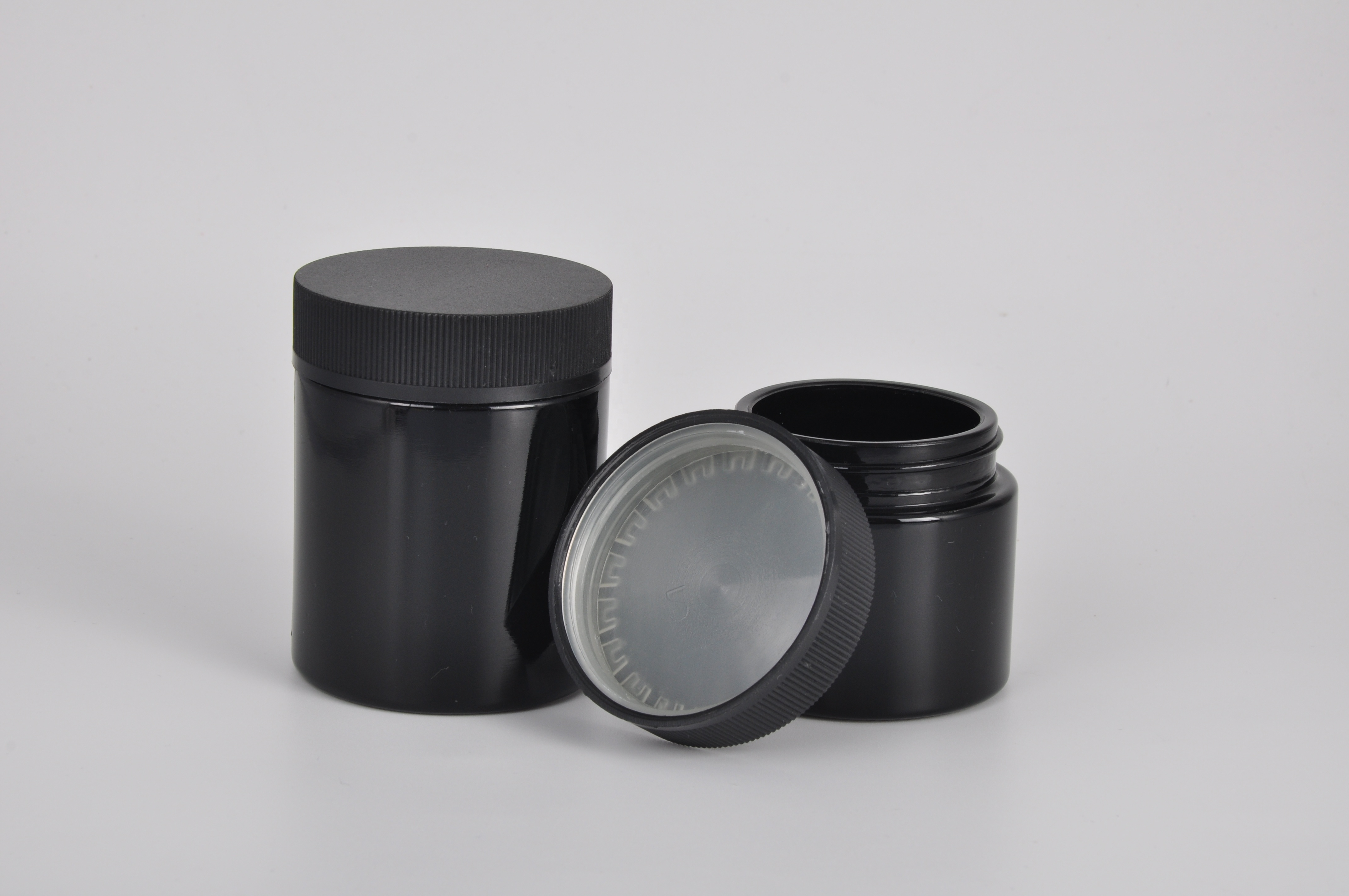 Wholesale Airtight 50ml 100ml Black UV Smell Proof Refillable Tall Wide Mouth Dark Violet Glass Storage Containers Jar