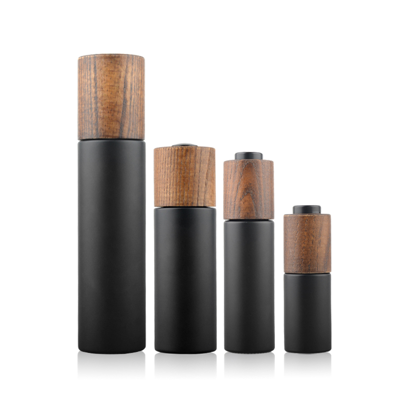 Wholesale Black Glass Dropper Bottle With New developed wooden bamboo lid and pump
