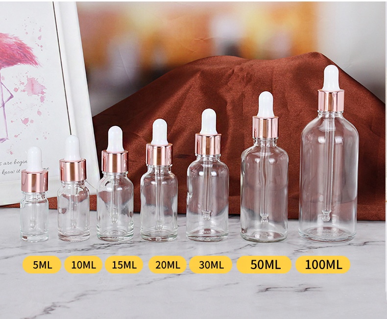 Wholesale Cheap Cosmetic Rose Gold Empty Essential Oil Clear Glass Bottles 15ml 20ml 30ml 50ml Face Serum Frosted Dropper Bottle