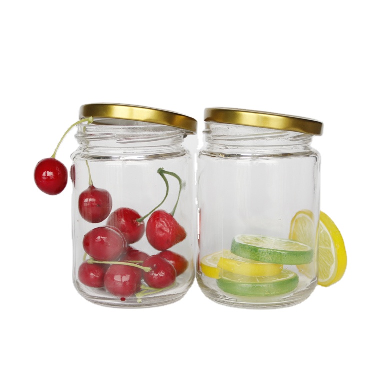 Wholesale Cheap Round Bottles Glass Jars Food Storage 100ml 200ml 300ml 400ml 500ml 700ml 1000ml variety size with metal Lids