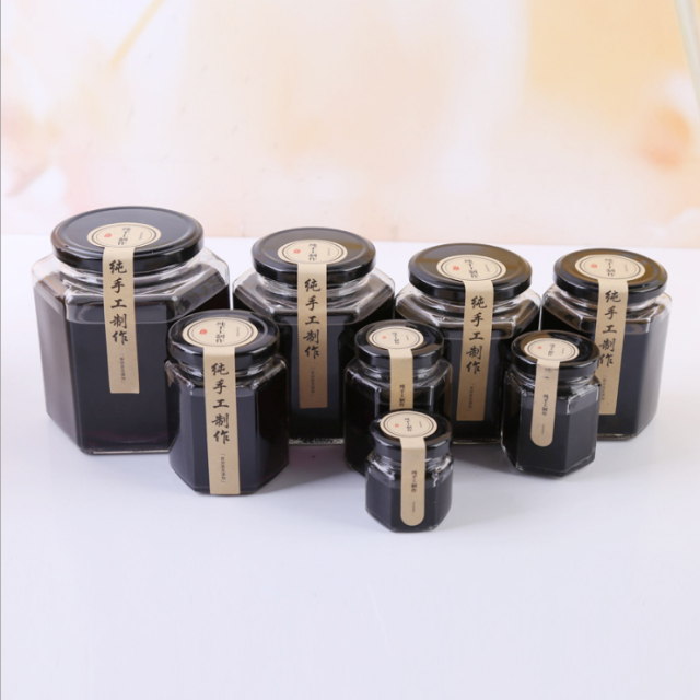 Wholesale Clear Round Shaped Hermetic 750ml 25oz Glass bee Storage Jar Storage Food Honey Glass Jar With Metal Lid