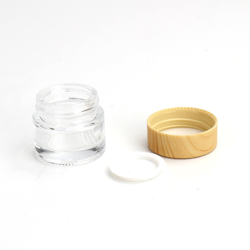 Wholesale Cosmetic 1oz 2oz clear frosted glass jar bamboo wood grain plastic lid with plastic inner