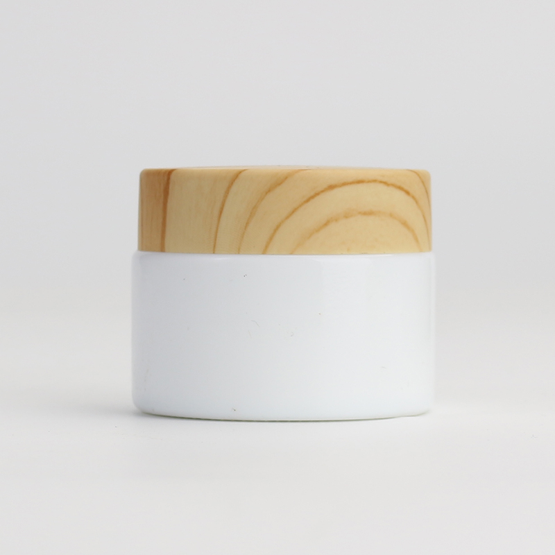 Wholesale Cosmetic 1oz 2oz white glass jar bamboo wood grain plastic lid with plastic inner