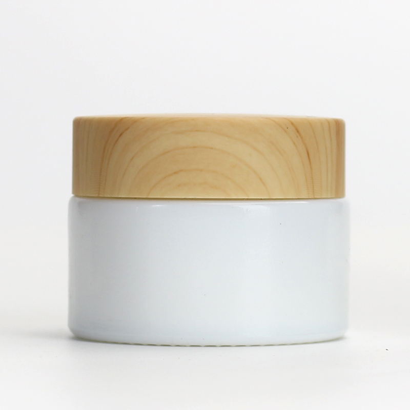 Wholesale Cosmetic 1oz 2oz white glass jar bamboo wood grain plastic lid with plastic inner