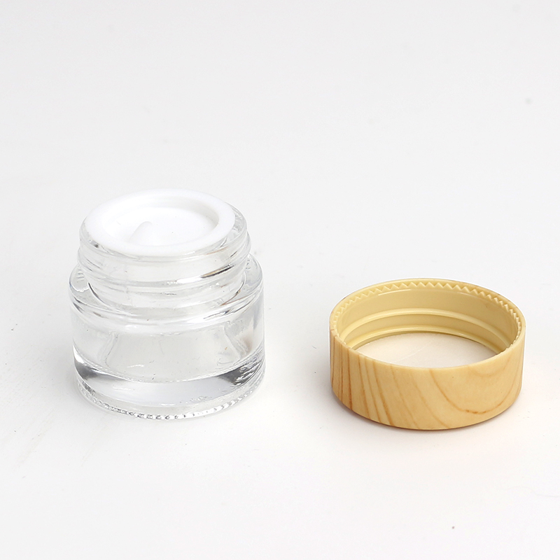 Wholesale Cosmetic 5g 10g 15g 20g 30g 50g 60g 100g clear frosted glass jar wood bamboo grain plastic cover with plastic inner