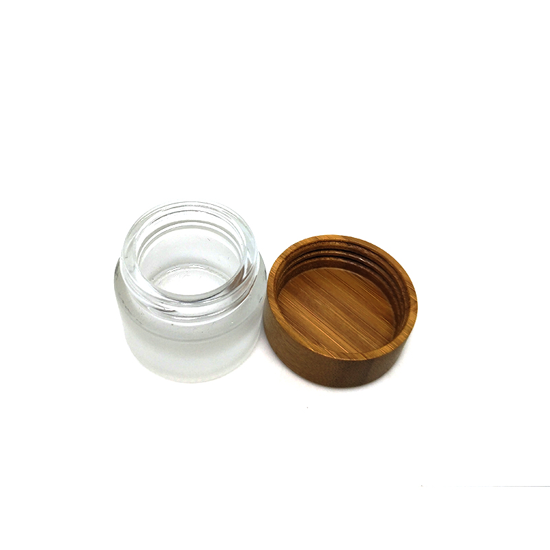 Wholesale Cosmetic 5g 10g 15g 30g 50g 100g clear frosted glass jar bamboo lid with plastic inner bamboo cream