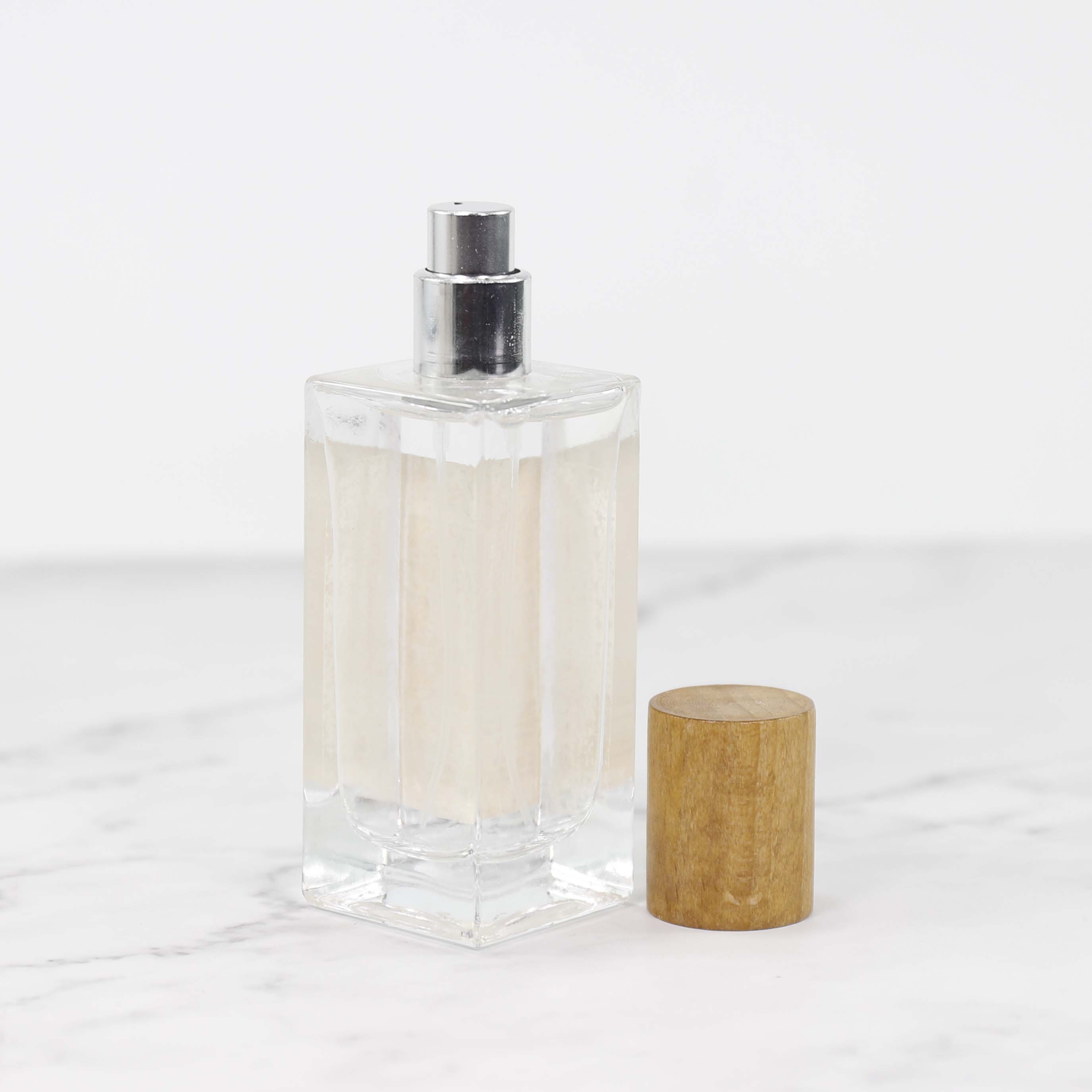 Wholesale Cosmetic Packaging 50ml Spray Glass Perfume Bottle With Bamboo Cover