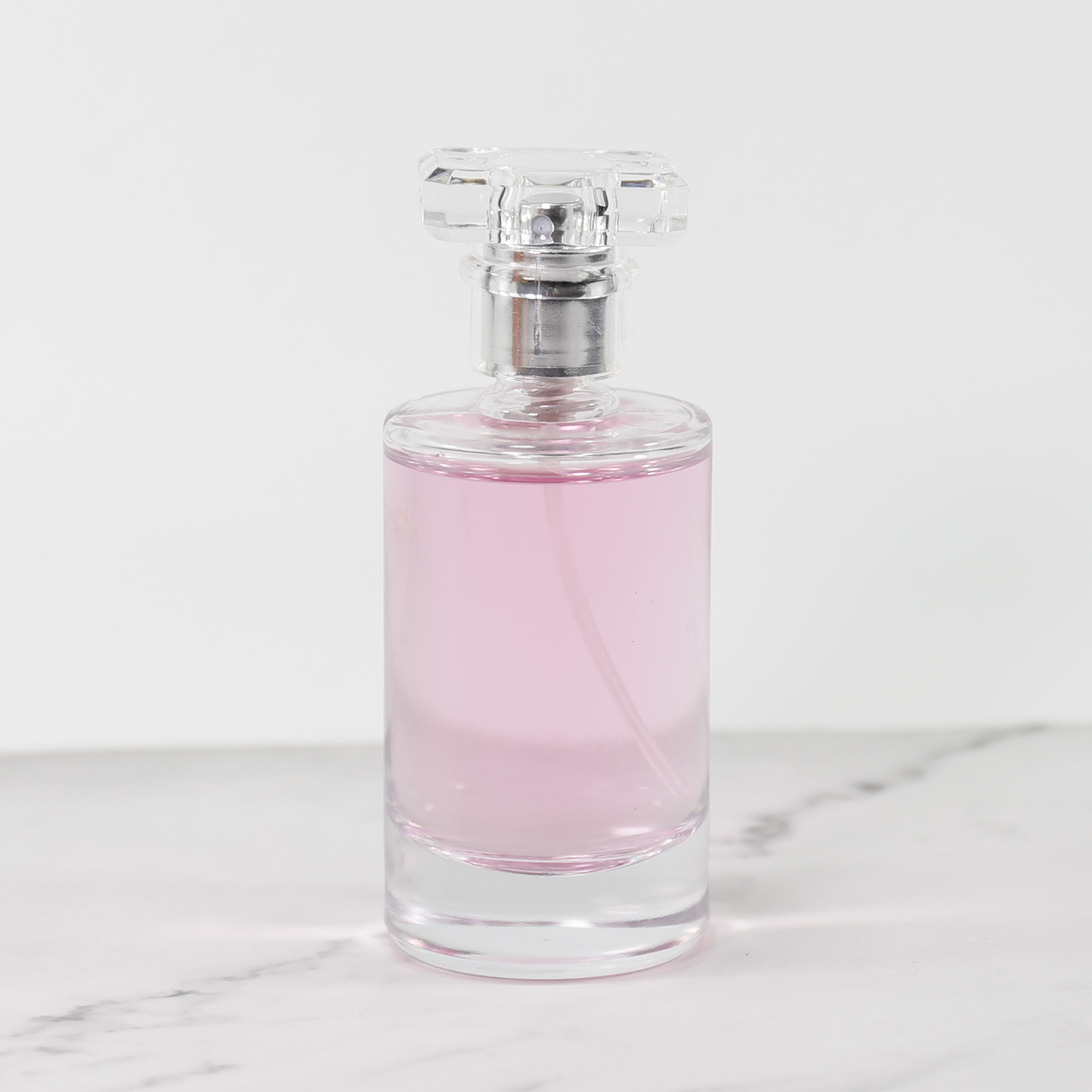 Wholesale Custom 50ml 100ml Round Empty Transparent Glass Perfume Oils Bottles