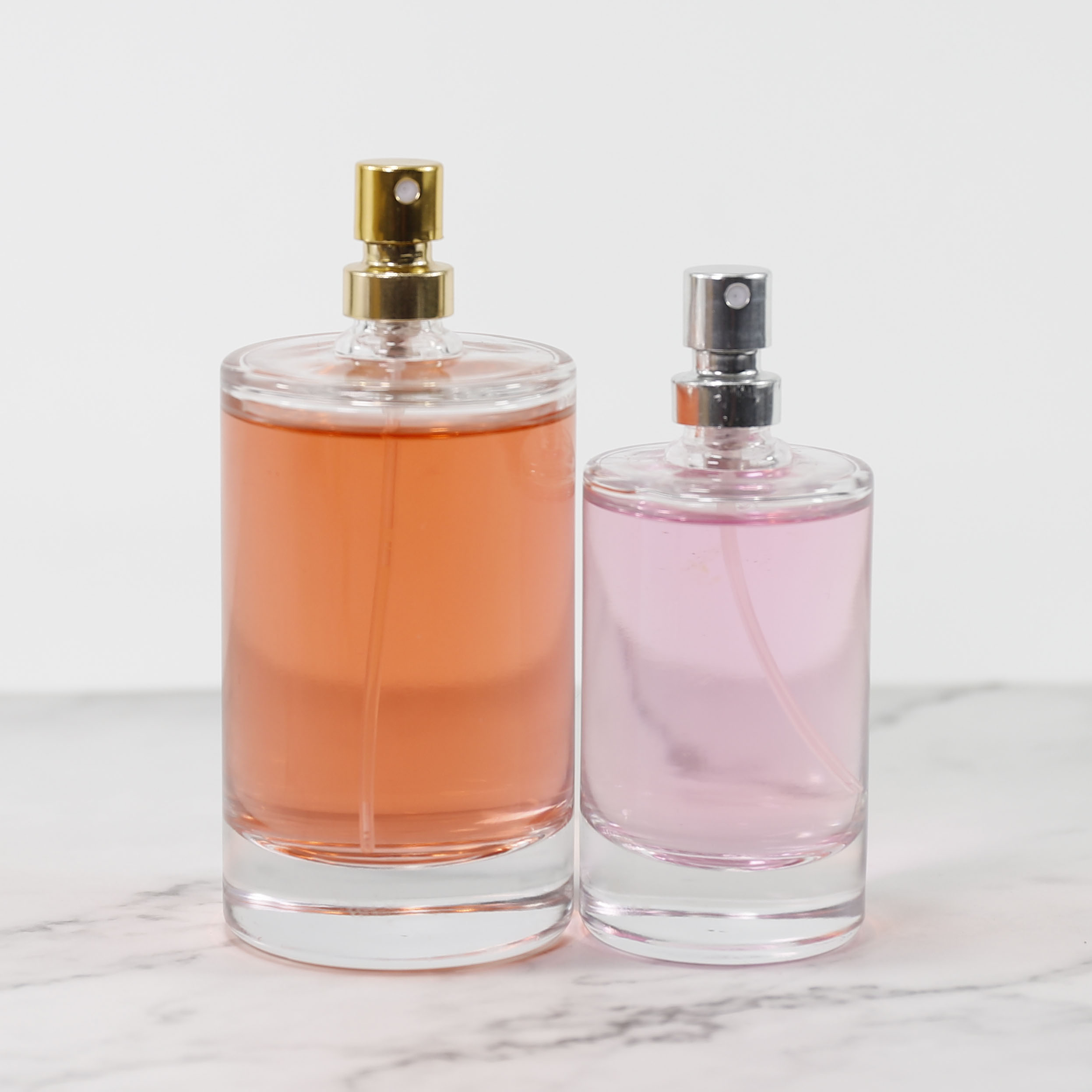 Wholesale Custom 50ml 100ml Round Empty Transparent Glass Perfume Oils Bottles