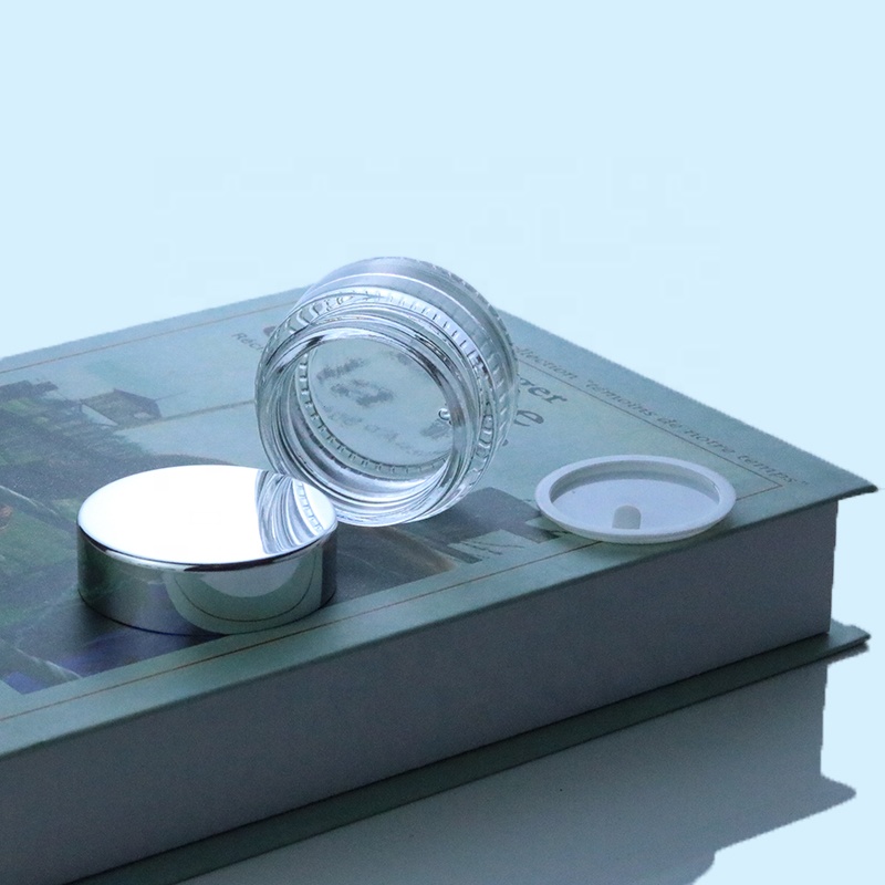 Wholesale Custom Small Round Packaging 1oz Glass Jar Clear With UV Silver Lid (GJM03)