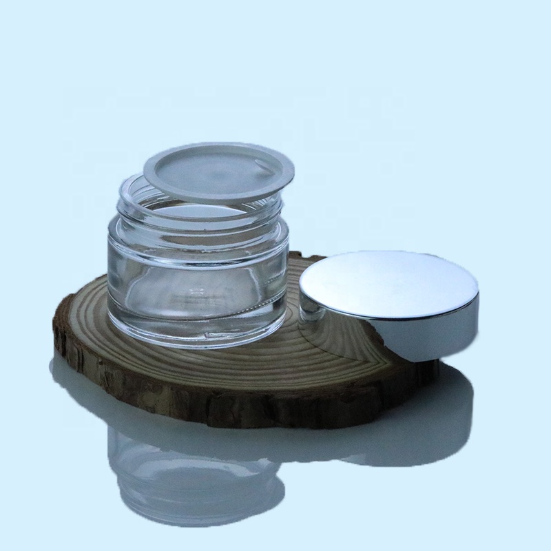 Wholesale Custom Small Round Packaging 1oz Glass Jar Clear With UV Silver Lid (GJM03)