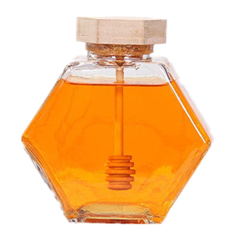 Wholesale Customized 100ml 220ml 380ml Empty Clear Hexagonal Honey Jar Glass With Wooden Lid And Dipper