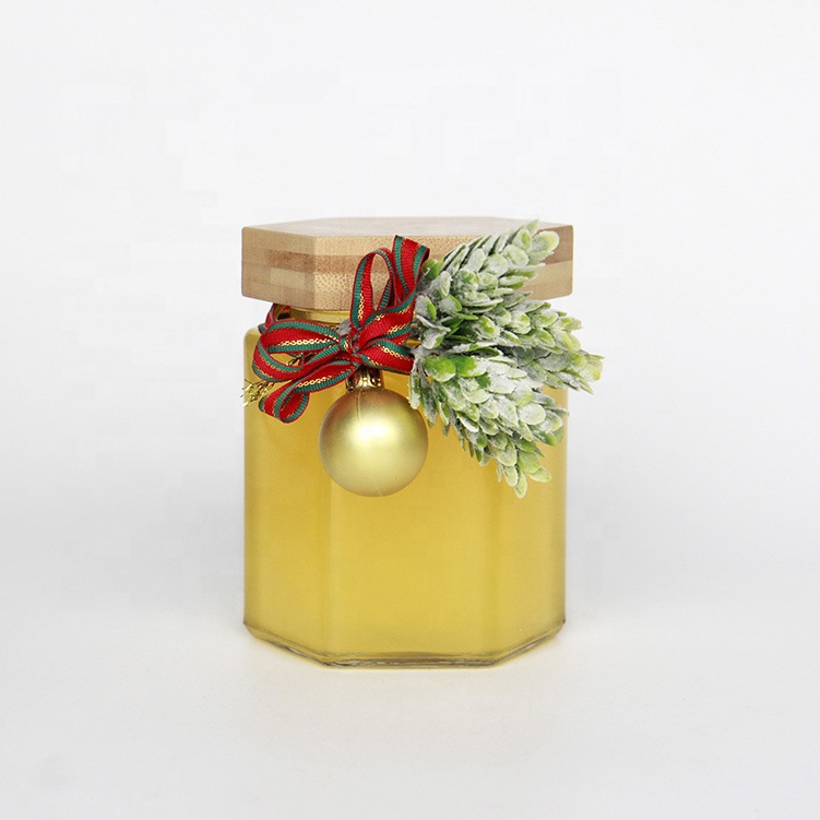 Wholesale Customized Hexagon Shaped 100ml 200ml Empty Clear Hexagonal Honey Jar Glass with Wooden Lid