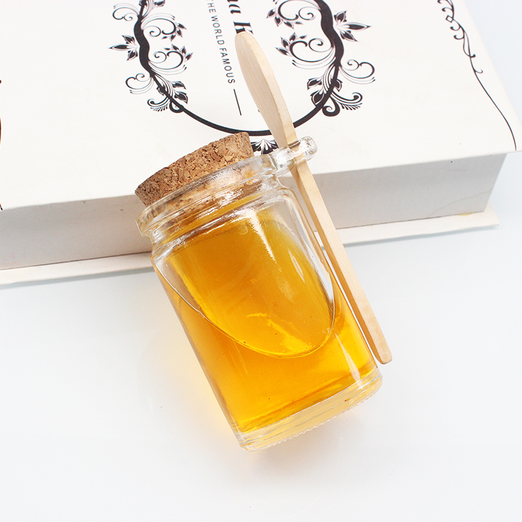 Wholesale Delicate honey glass jar 250ml glass jar with wooden lid and spoon