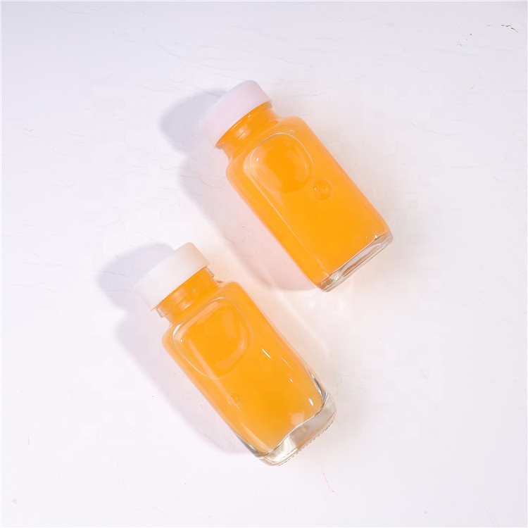 Wholesale Empty 1 Ounce 2oz 60ml Ginger Juice Square Transparent Beverage Glass Bottles For Juice