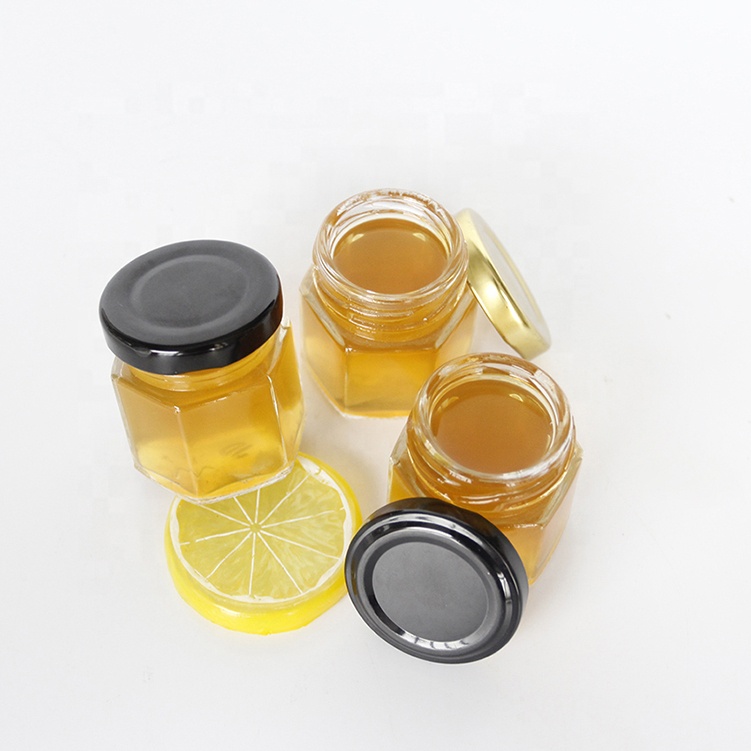 Wholesale Empty Hexagonal Glass Honey Container Honey Storage Bottle Glass Honey Jar With Matel Lid