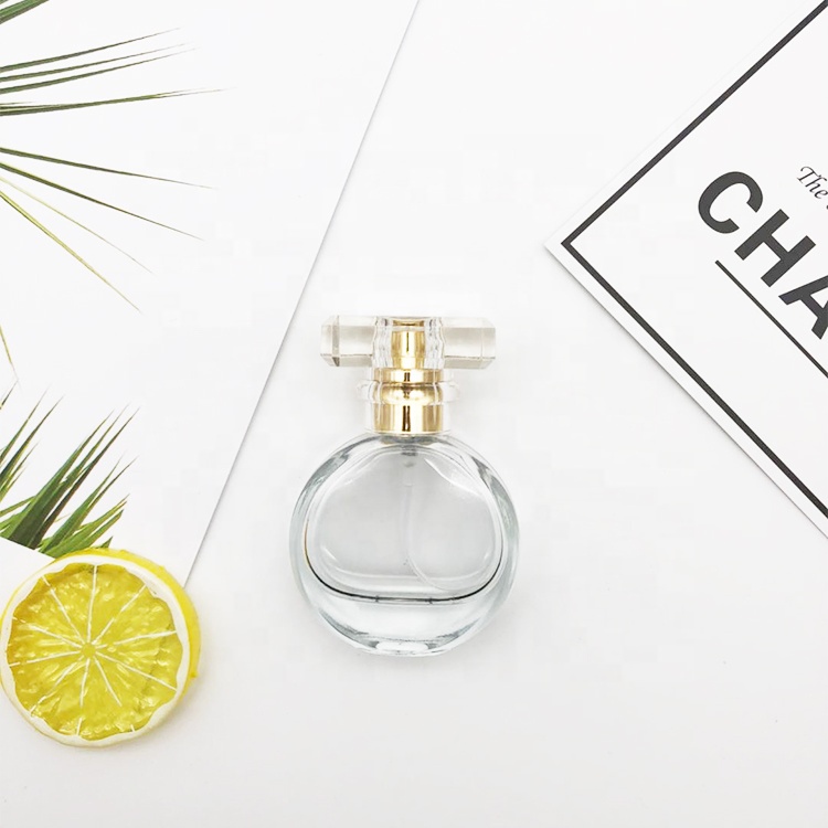 Wholesale Empty Miniature Premium Portable Clear Flat Round Perfume Glass Spray Bottle