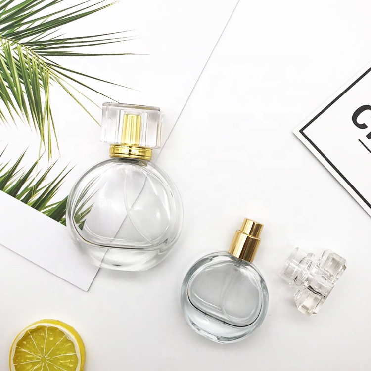 Wholesale Empty Miniature Premium Portable Clear Flat Round Perfume Glass Spray Bottle