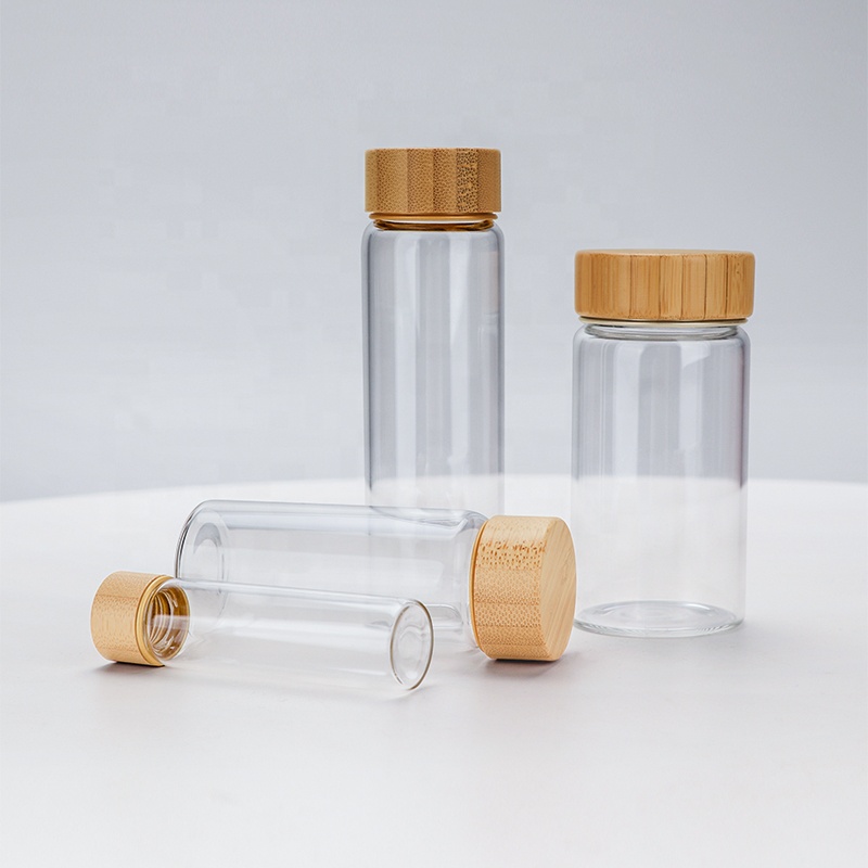 Wholesale Empty Small Glass Bottle 10ml 20ml 30ml 50ml Borosilicate Clear Tube Bottle Glass Bamboo Screw Cap Glass Bottle