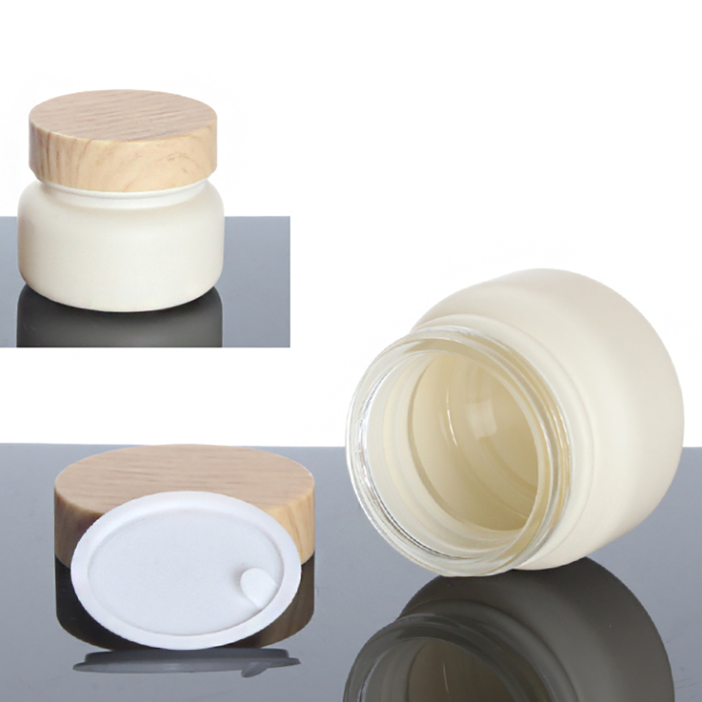 Wholesale Environmental Cosmetic 50g Frosted Glass Jar Bamboo Lids For Skin Care