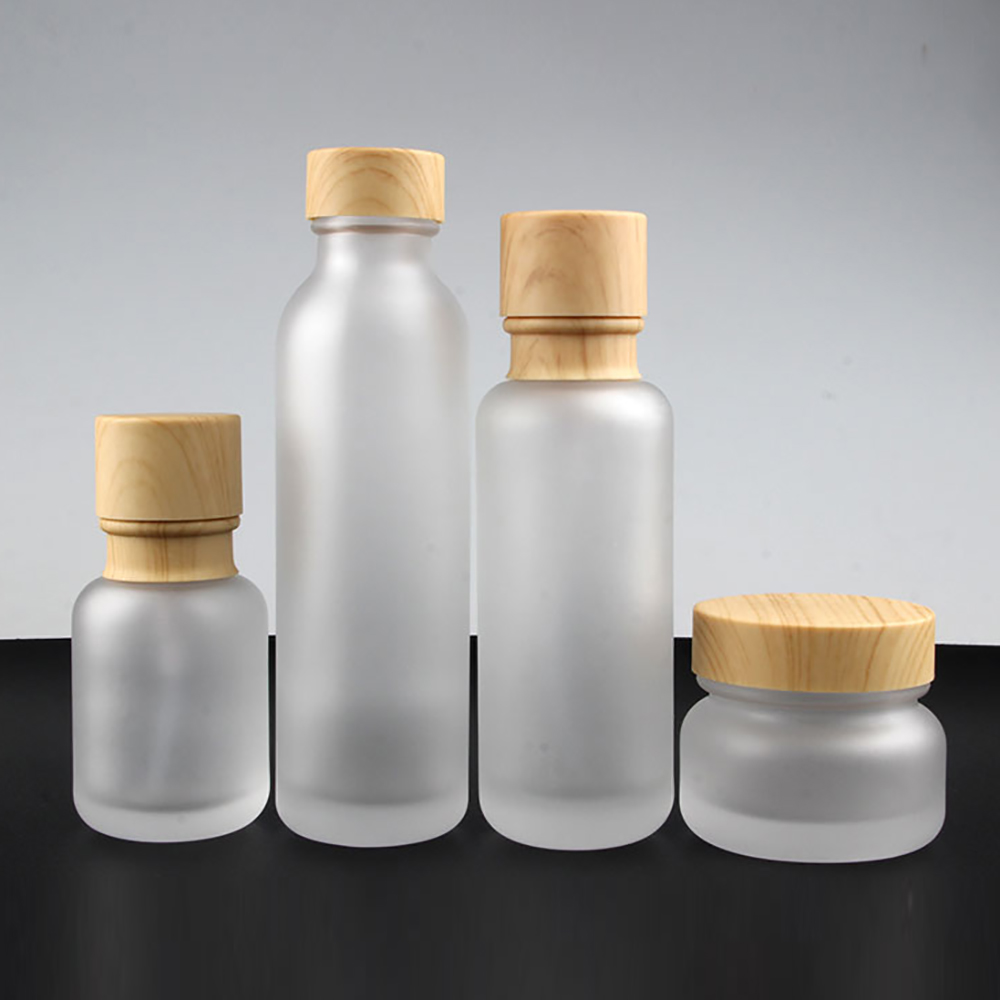 Wholesale Environmental Cosmetic 50g Frosted Glass Jar Bamboo Lids For Skin Care