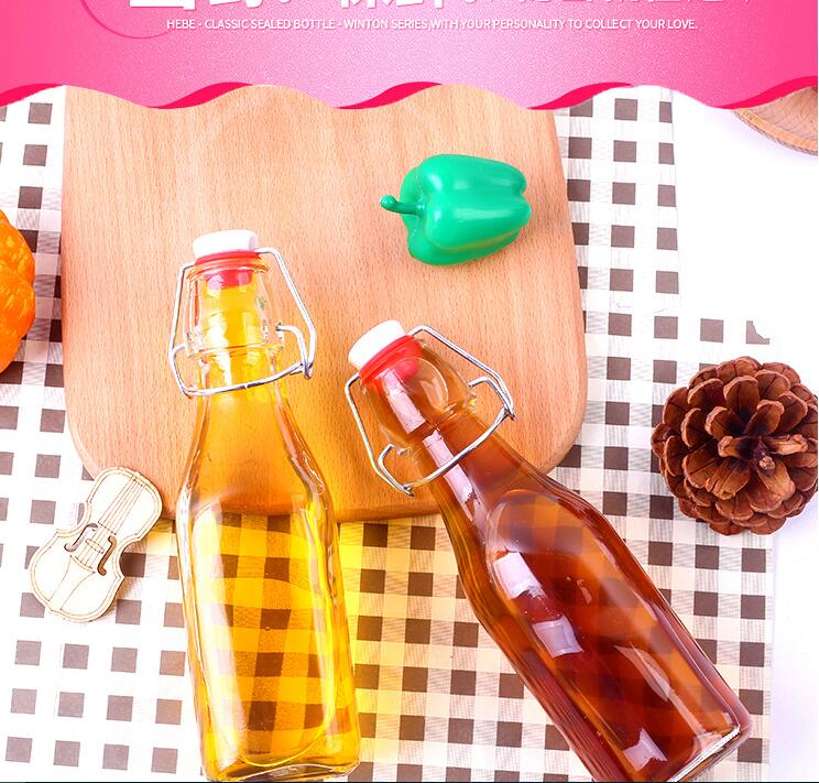 Wholesale Factory price 500ml Empty Clear Drinking Beverage Container Glass Bottle glass swing top bottle550ml 1228