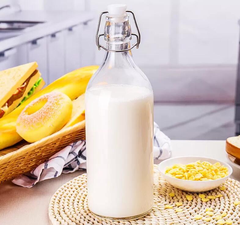 Wholesale Factory price 500ml Empty Clear Drinking Beverage Container Glass Bottle glass swing top bottle550ml 1228
