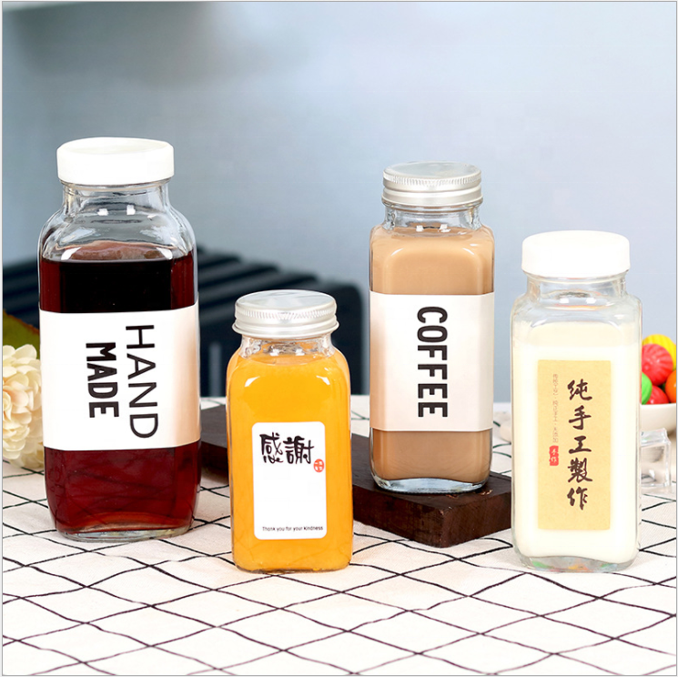 Wholesale Fashion Bulk Empty Carbonated Beverage Cold Pressing Juice Milk Tea Glass Bottles