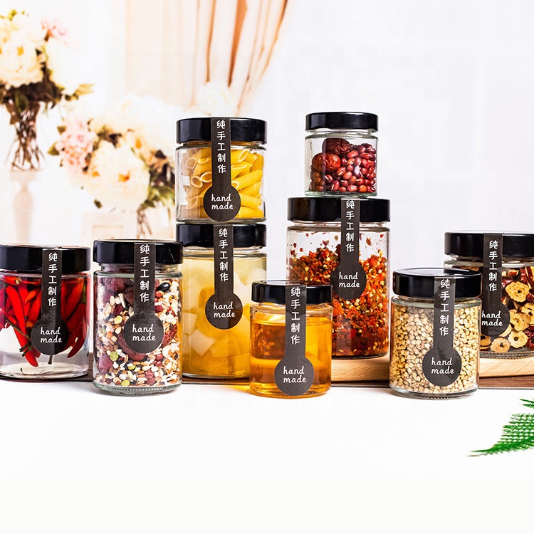 Wholesale Food Grade Empty Round Clear Mini Jam Honey Glass Jar Small Glass Jars with Black Metal Lid
