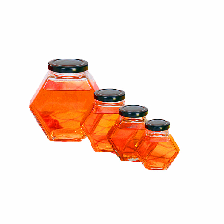 Wholesale Hexagonal Glass Honey Container Honey Storage Bottle  Glass Honey Jar With Matel Lid