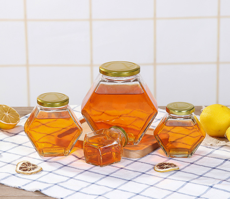 Wholesale Hexagonal Glass Honey Container Honey Storage Bottle Glass Honey Jar With Matel Lid