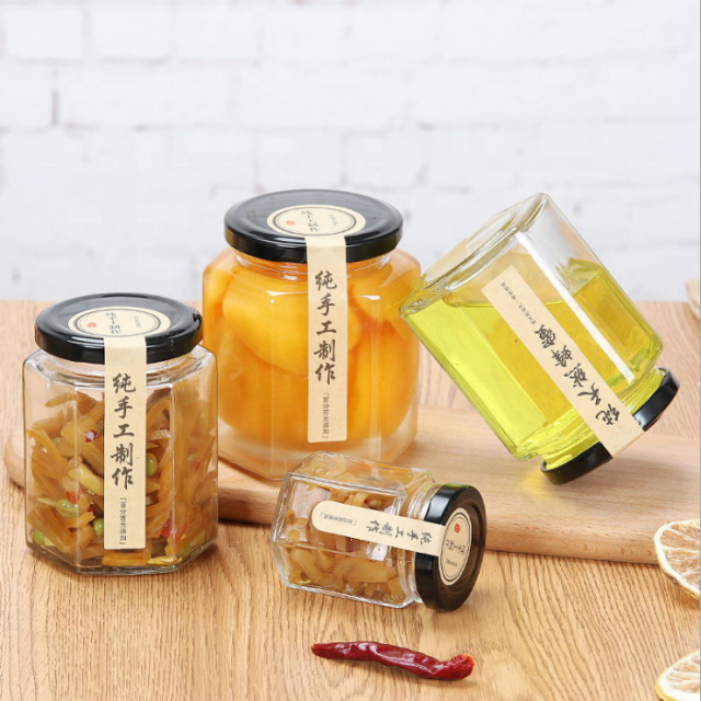Wholesale Hexagonal Glass Honey Container Honey Storage Bottle Glass Honey Jar With Metal Lid