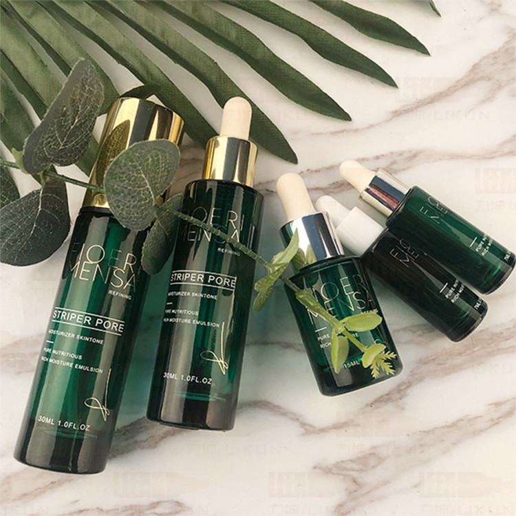 Wholesale High-grade luxurious GREEN glass cosmetic bottles and jars with silver caps in good price