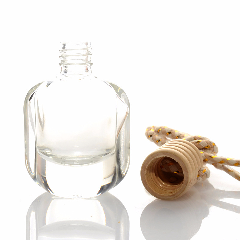 Wholesale Hot Sale 10ml Hanging Wooden Cover Transparent Glass Car Aromatherapy Perfume Bottle