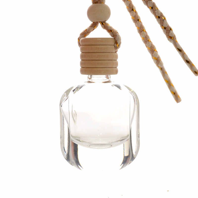 Wholesale Hot Sale 10ml Hanging Wooden Cover Transparent Glass Car Aromatherapy Perfume Bottle