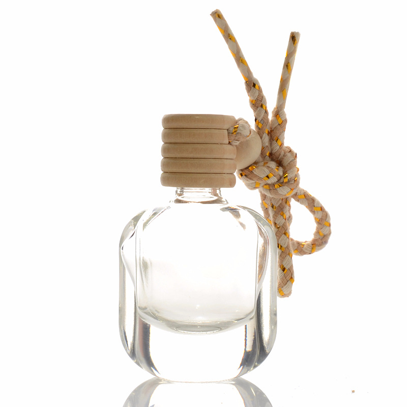 Wholesale Hot Sale 10ml Hanging Wooden Cover Transparent Glass Car Aromatherapy Perfume Bottle