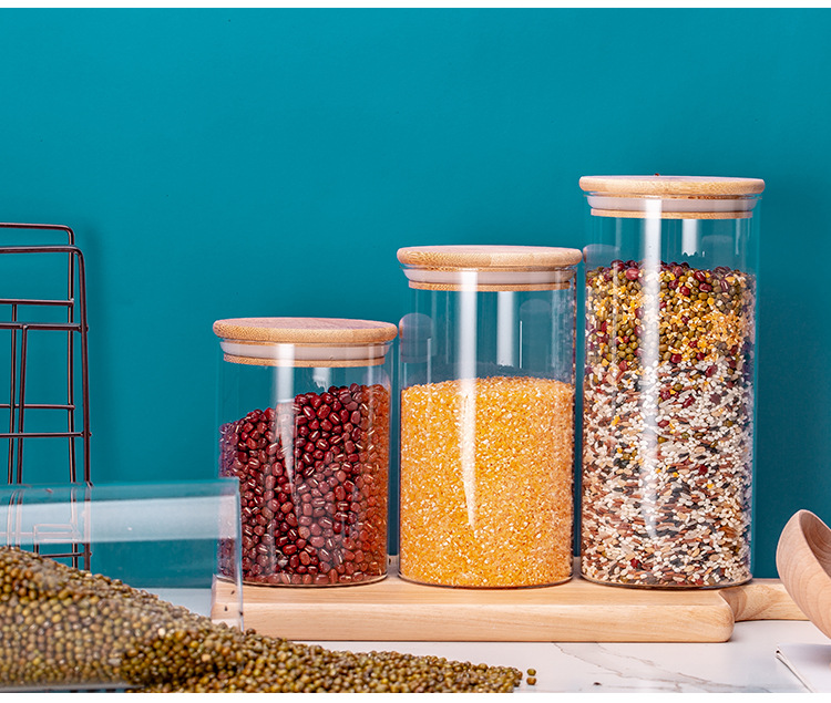 Wholesale Hot Sale Clear Glass Jars With Sealed Bamboo Wood Lids For Food Storage Spice Grains Tea Candy Coffee